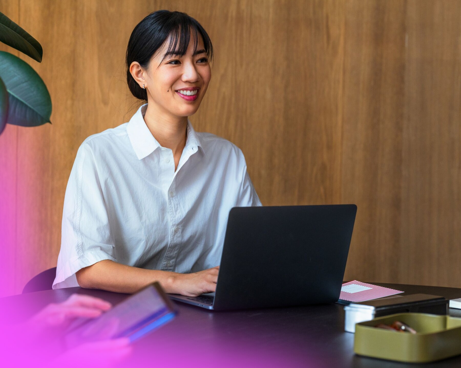 Marketing professional working on a laptop